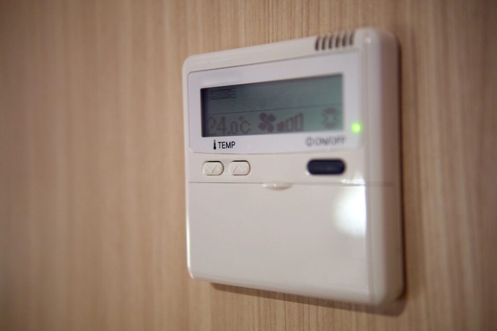 Close-Up of Digital Wall Thermostat with Temperature Controls